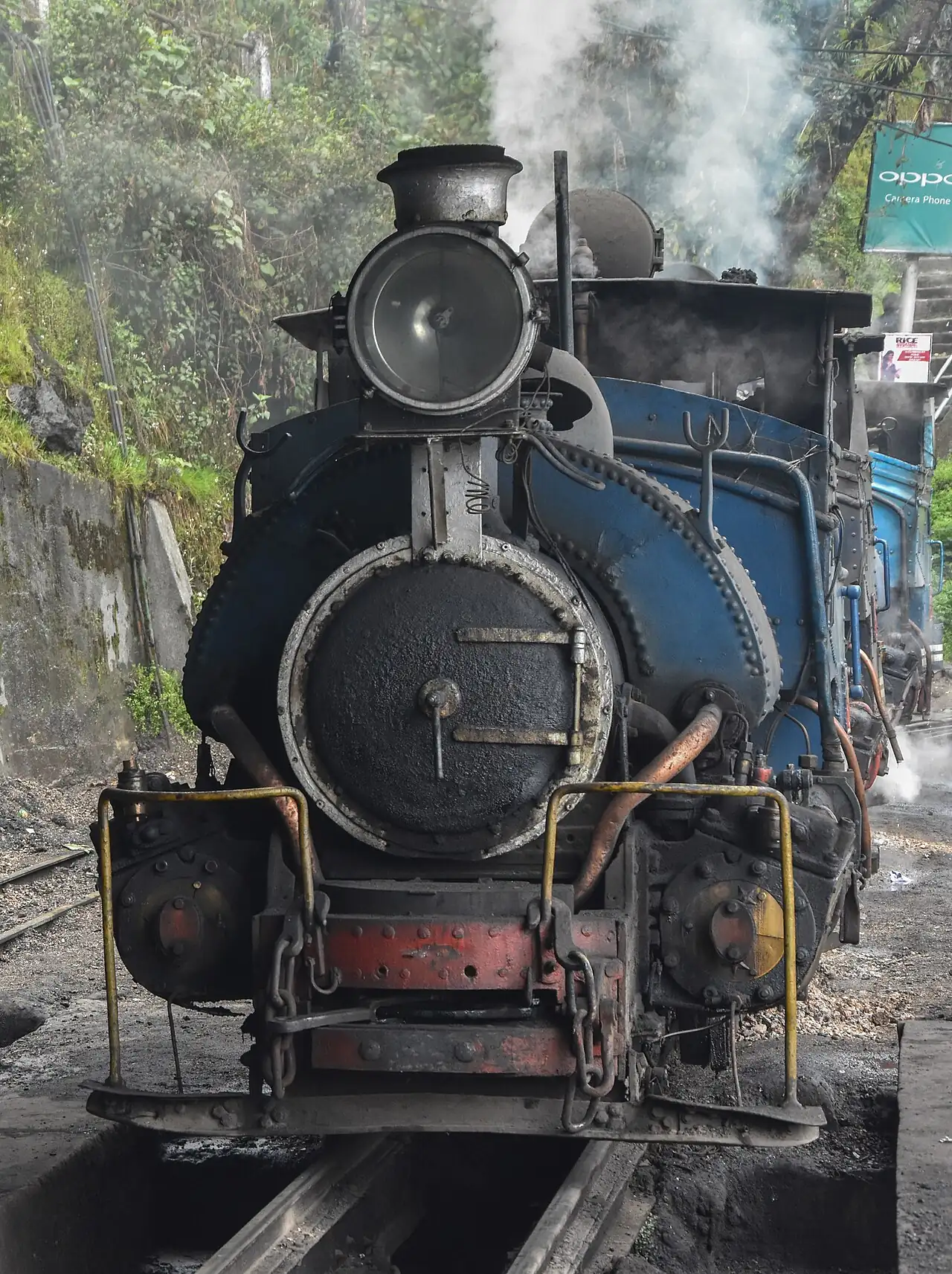 The Darjeeling Himalayan Railway toy train on a mountain track