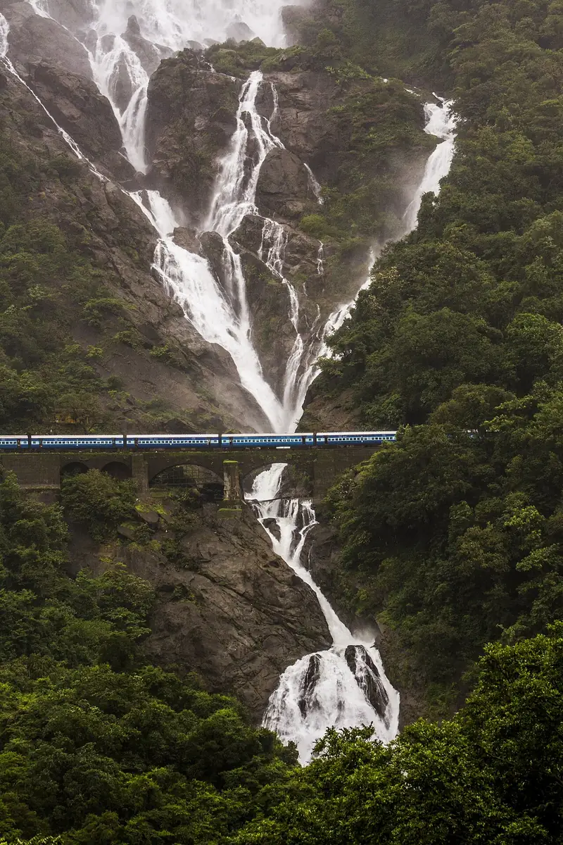 The multi-tiered Dudhsagar Falls cascading through forested cliffs, Goa