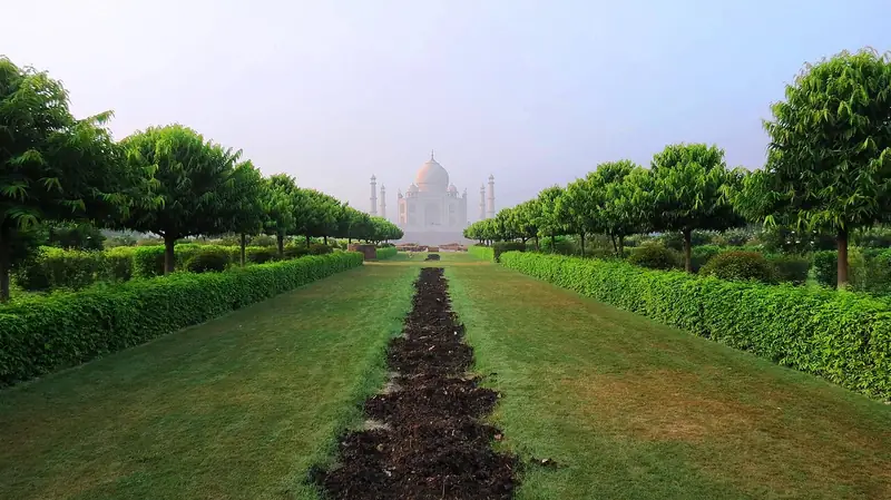The Taj Mahal seen across the Yamuna from the Mehtab Bagh gardens