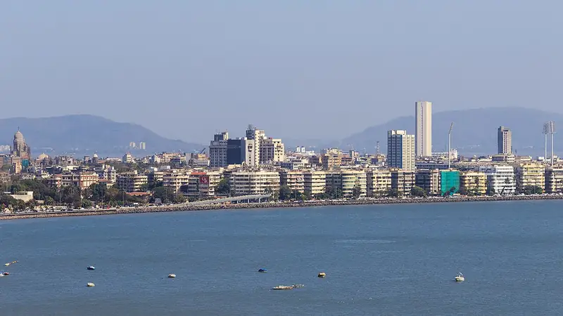 The sweeping seafront curve of Marine Drive and the city skyline, Mumbai